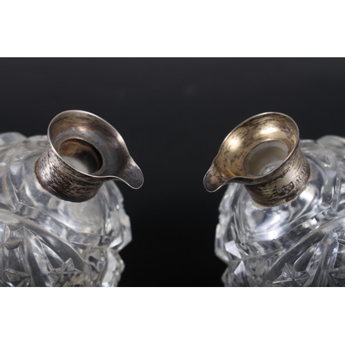 308 - A pair Mappin & Webb cut glass silver collared condiment bottles, 3 1/2