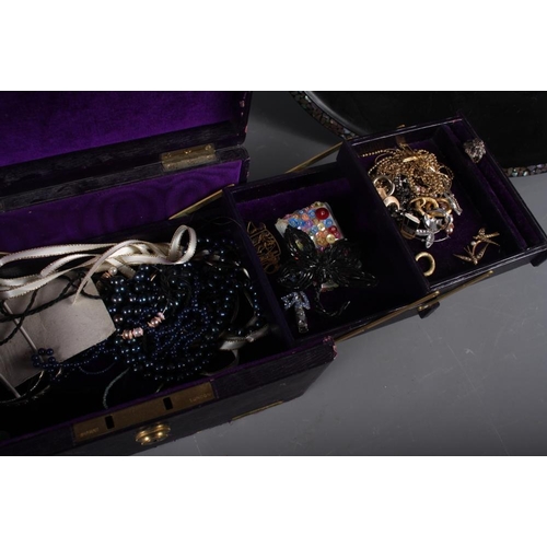 328 - A quantity of costume jewellery, including earrings, necklaces and other jewellery, contained in a p... 