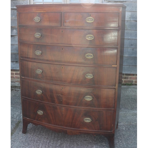 436 - An early 19th century figured mahogany bowfront chest of two short and five graduated long drawers w... 