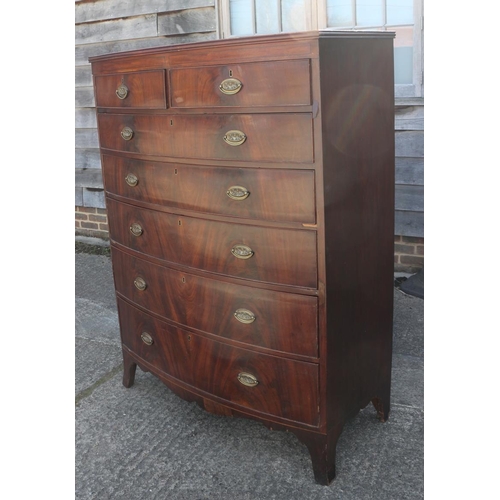 436 - An early 19th century figured mahogany bowfront chest of two short and five graduated long drawers w... 