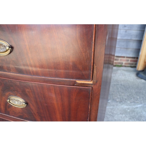 436 - An early 19th century figured mahogany bowfront chest of two short and five graduated long drawers w... 