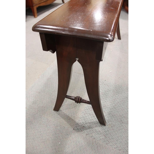 440 - A late Victorian mahogany organ stool with panel seat, on splay supports, 54