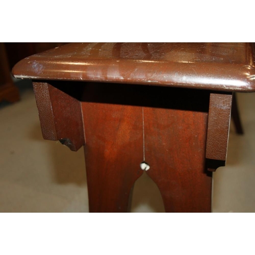 440 - A late Victorian mahogany organ stool with panel seat, on splay supports, 54