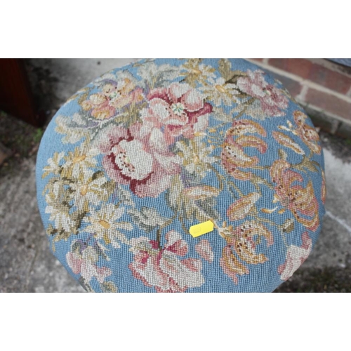 456 - A Victorian rosewood piano stool with adjustable circular needlepoint seat, on spiral turned column ... 