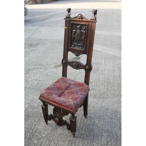 472 - A 19th century Renaissance revival carved walnut side chair with panel back monogrammed 