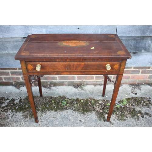 477 - A late Georgian mahogany, shell paterae inlaid and banded side table, fitted one drawer, on square t... 