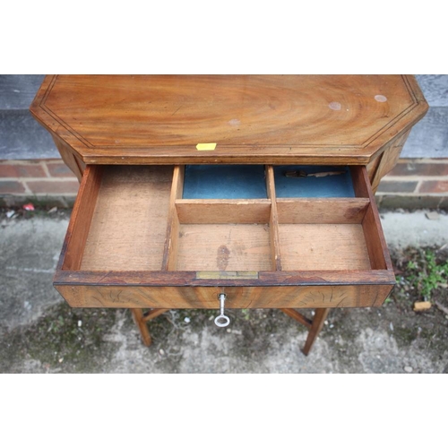 479 - A George III figured mahogany and ebony line inlaid octagonal work table, fitted drawer and fabric w... 