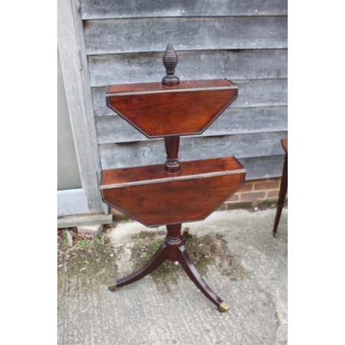 481 - A Georgian mahogany two-tier octagonal drop leaf dumb waiter, on turned column and tripod splay supp... 