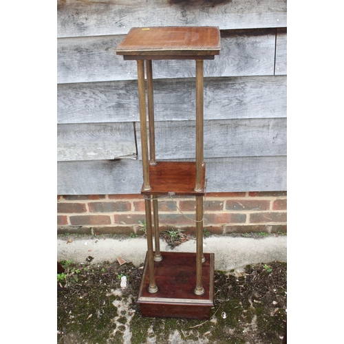 483 - A 19th century French mahogany and brass three-tier etagere, on fluted columns and square base, 12