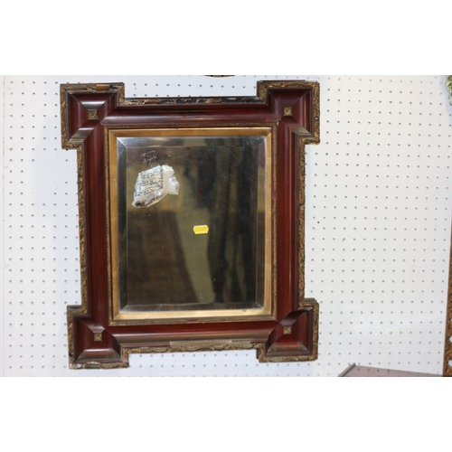 502 - A 19th century rosewood and gilt framed rectangular wall mirror with bevelled plate, 19