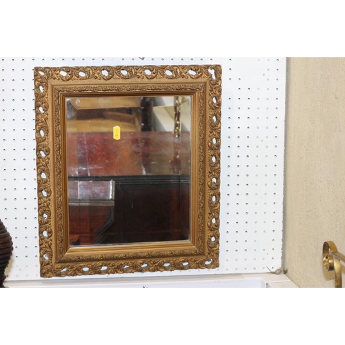 502 - A 19th century rosewood and gilt framed rectangular wall mirror with bevelled plate, 19