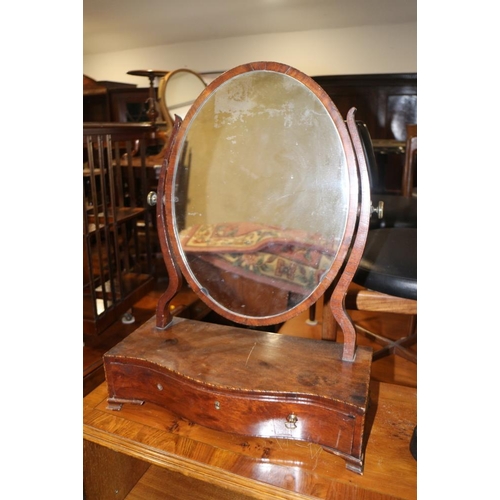 508 - A George III mahogany, box and ebony strung serpentine front oval swing frame toilet mirror, on plat... 