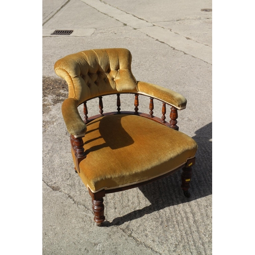 532 - An oak framed tub chair, upholstered in an ochre velour, on turned supports, and a child's 1920s low... 