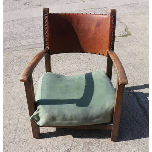 532 - An oak framed tub chair, upholstered in an ochre velour, on turned supports, and a child's 1920s low... 