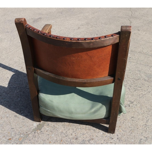 532 - An oak framed tub chair, upholstered in an ochre velour, on turned supports, and a child's 1920s low... 