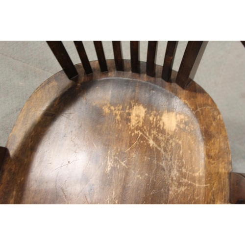 557 - A 1930s polished as walnut desk elbow chair with panel seat, on square taper stretchered supports