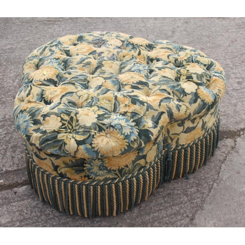 576 - A Peter Dudgeon trefoil ottoman, button upholstered in a floral tapestry, 36