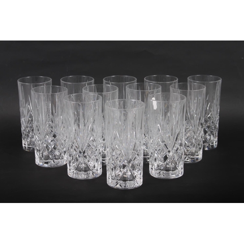 63 - A set of twelve cut glass drinking glasses, 5 3/4