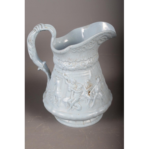 64 - A 19th century jug with relief acorn decoration, 7 1/4