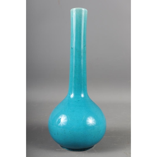 66 - A Carltonware crimson and lustre glazed vase, 9 1/4