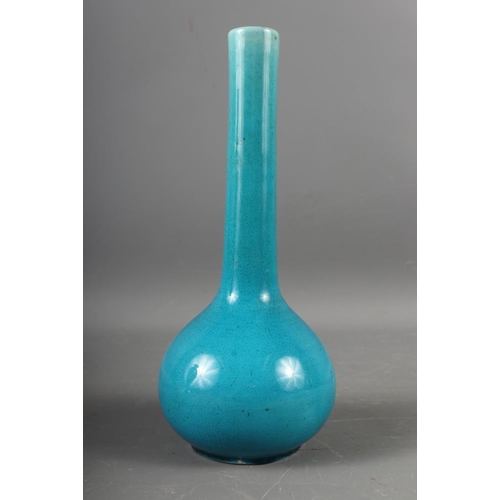 66 - A Carltonware crimson and lustre glazed vase, 9 1/4