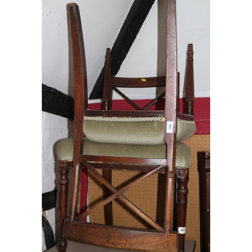 405 - A pair of early 19th century mahogany 'X' back dining chairs with stuffed over seats, on turned supp... 