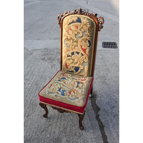 451 - A late Victorian carved rosewood showframe prie dieu/nursing chair with Pugin style needlepoint seat... 