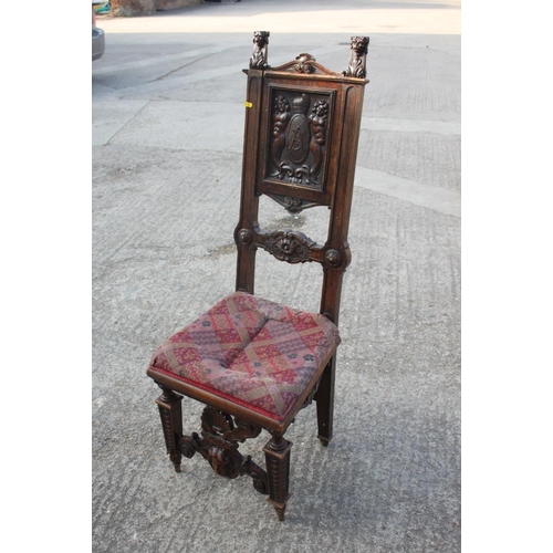 472 - A 19th century Renaissance revival carved walnut side chair with panel back monogrammed 