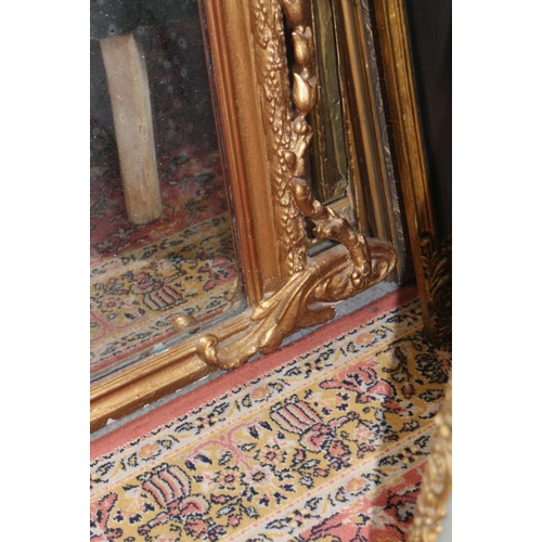 506 - A 19th century rectangular wall mirror with carved giltwood frame, 69