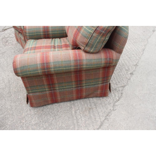 594 - A pair of deep seat armchairs with loose seat and back cushions, upholstered in a tartan fabric