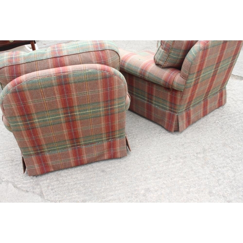 594 - A pair of deep seat armchairs with loose seat and back cushions, upholstered in a tartan fabric