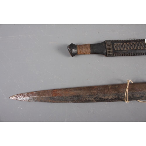 120 - Two East African carved hardwood spears, 40