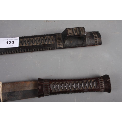 120 - Two East African carved hardwood spears, 40