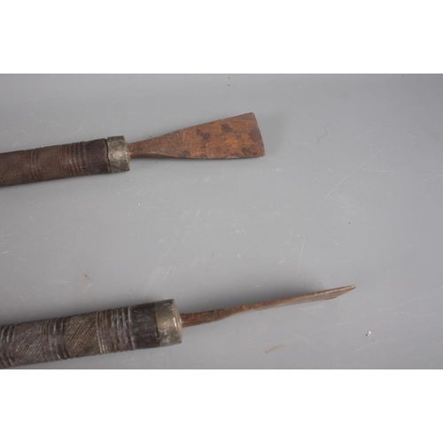 120 - Two East African carved hardwood spears, 40