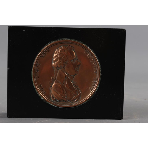 249 - An 18th century copper medallion, 