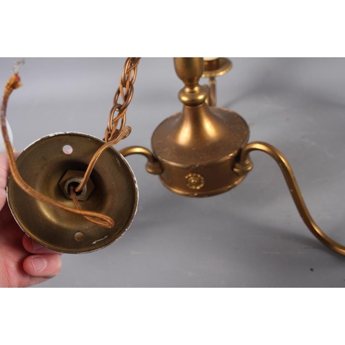 258 - A pair of gilt metal three-light ceiling lights, 13 1/2