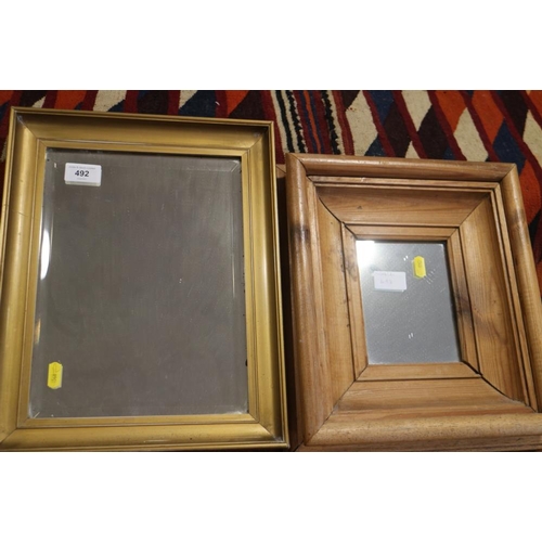 492 - A rectangular gilt framed wall mirror with bevelled plate, 11 1/2