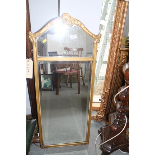 497 - A gilt framed arch top wall mirror with bevelled plate, 39