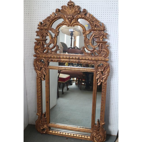 510 - A 17th century design carved giltwood wall mirror, plate 25 1/4