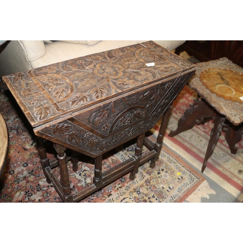 513 - An Edwardian walnut octagonal table, on turned and stretchered supports, supplied by Bowman Bros Cam... 