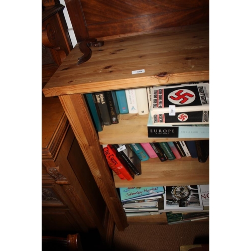 604 - A pine open bookcase, fitted adjustable shelves, 62