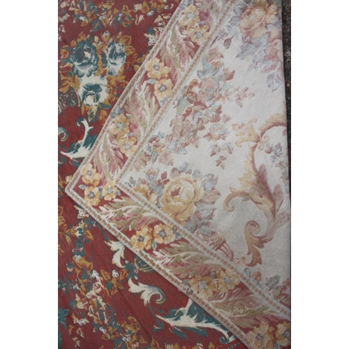 612 - A Jacquard woven floor carpet of 18th century design with floral scroll design, 100