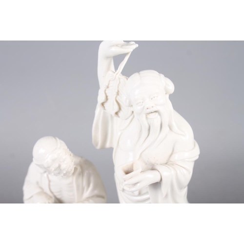 105 - A Chinese blanc-de-chine figure of two sages, 7