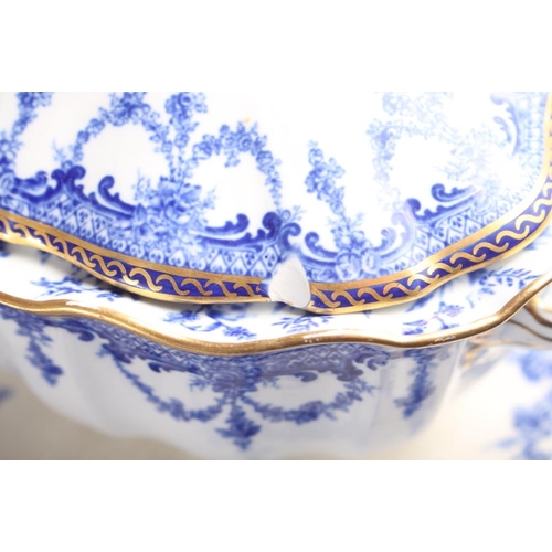 35 - A Royal Crown Derby blue and white part dinner service, decorated floral swags with gilt borders, ei... 