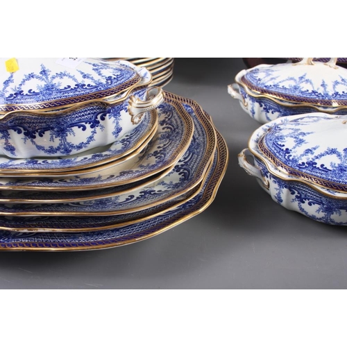 35 - A Royal Crown Derby blue and white part dinner service, decorated floral swags with gilt borders, ei... 