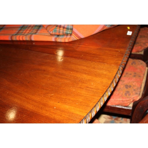 488 - A late 19th century mahogany oval extending dining table with three extra leaves, on cabriole claw a... 