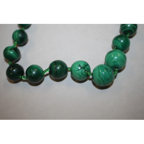 327 - A jadeite graduated pebble bead necklace, 36