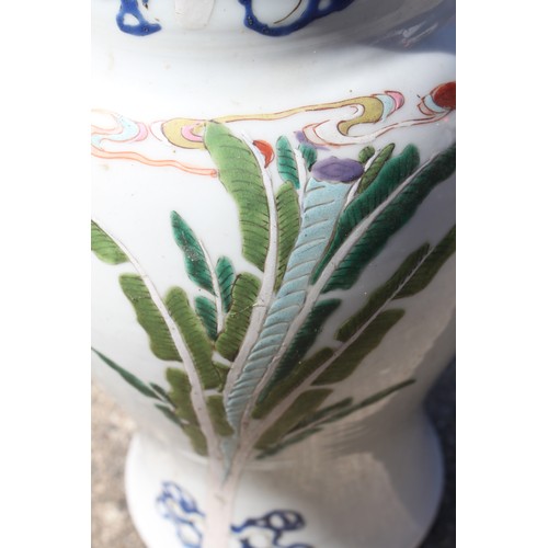 104 - A 19th century Chinese porcelain vase, decorated in polychrome enamels with numerous figures, blue r... 