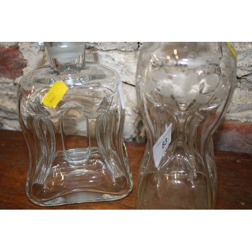 83 - Two hourglass decanters and stoppers, a cut glass bowl and a modern decanter