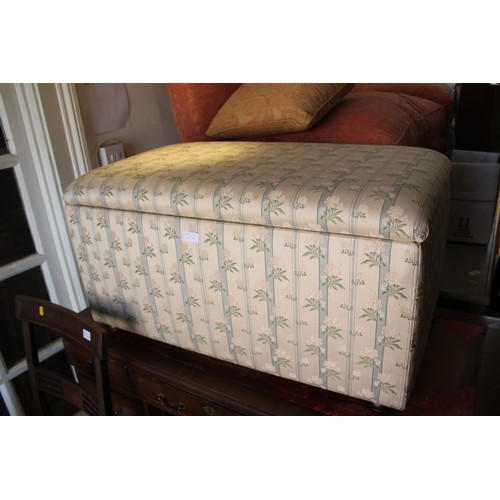 581 - A box seat ottoman, interior fitted as a filing cabinet, upholstered in a glazed chintz, 32